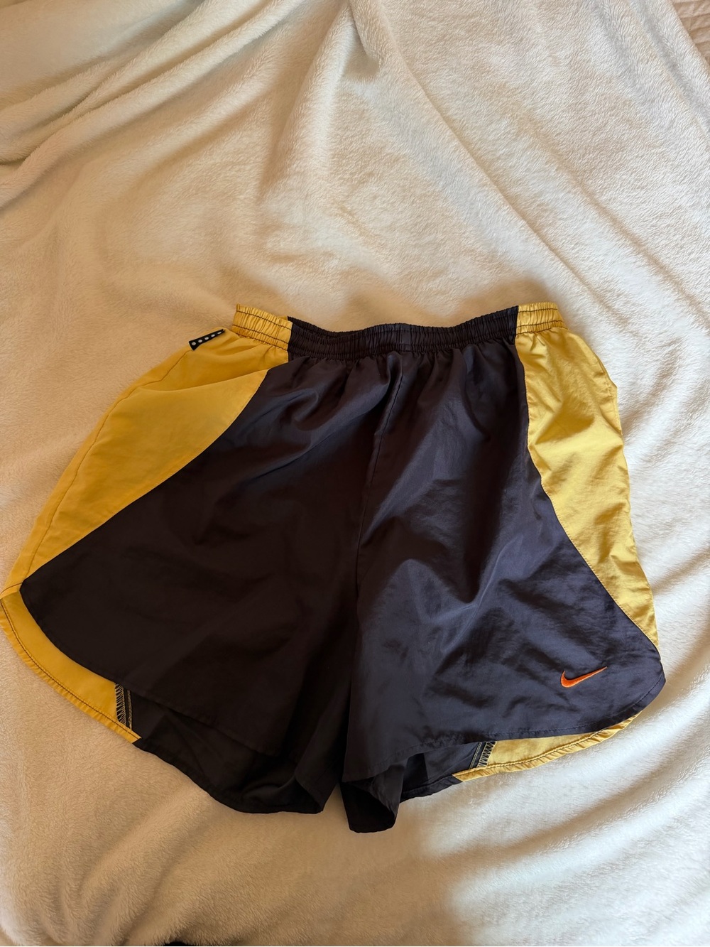 Nike Women’s Black and Yellow Athletic Shorts